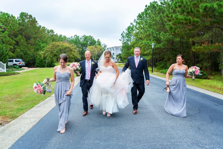 wedding party walking down the road knoxville nashville asheville wedding photographers