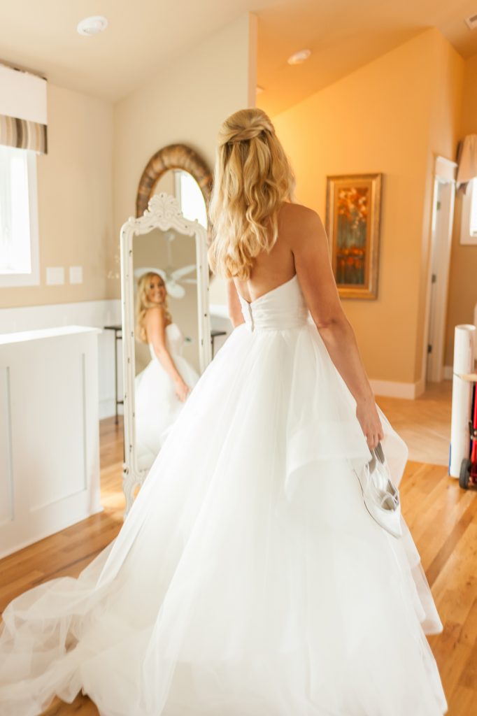 bride trying on wedding dress westland farms studio knoxville asheville nashville wedding photographer